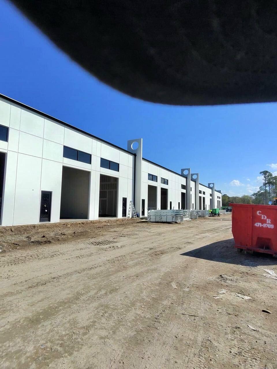 Multi-unit commercial construction project receiving gutter systems